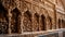 Ornate arches and columns adorn ancient Hindu tomb in India generated by AI