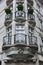 ornate balcony railings of elegant old apartment building