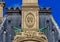 Ornate baroque sculptures and relief on the gable of the roof of the famous Museum of Decorative Arts with ornate ceramics,