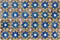 Ornate brightly colored Portugese tile texture in blue, purple, olive and yellow