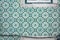 Ornate brightly colored Portugese tile texture in green and white