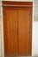 Ornate carved cedar door at the Madrasa Bou Inania in Fez, Morocco