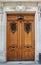 Ornate carved wooden door in Paris, France