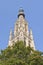 Ornate cathedral with green trees at Old Market, Breda, Netherlands