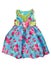 Ornate children`s dress with a floral pattern. Isolate on white