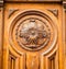 Ornate design on a wooden church door
