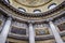 Ornate domed ceiling and columns with intricate patterns in the Rotunda of City Hall, Dublin, Ireland