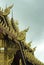 Ornate eaves and roof decorations of Wat Saen Muang Ma Luang, Chiang Mai, Thailand