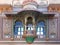 Ornate facade of wall overlooking an inner Peacock courtyard in Udaipur City Palace, Rajasthan, India