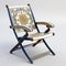 Ornate Folding Armchair With Solarization Effect Design