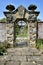 Ornate garden gate in walled garden at Castle Howard. York, England, UK. May 27, 2023.