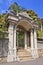 Ornate gate with ironwork and lush garden, Xiamen, China