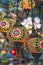 Ornate glass lights at a market stall