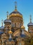 Ornate golden domes and crosses of the Russian Orthodox Church of the Assumption of Mary in Saint Petersburg Russia