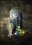 Ornate gothic window with candle and magic glass jar, wallpaper