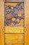 Ornate hand carved heavy old varnished wooden door with Dogwood Flower design.