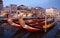 Ornate iconic gondolas parked in the canal in the early evening, Aveiro, Portugal