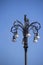 Ornate Iron Lamppost with Blue Sky