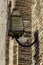 Ornate lamp on the wall of Castelvecchio, Verona, Italy