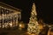 Ornate and lighted Christmas tree in the garden.