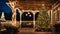 Ornate and lighted Christmas tree in the garden. Engraved Christmas tree and pergola on the terrace of the