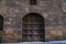 Ornate metal gate in a medieval gothic Renaissance building, Florence Italy