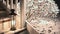 Ornate metal lantern on steps outside home with light snow falling