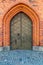 Ornate old side door at Riddarholmen Church in Stockholm Sweden