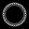 Ornate round frame gray on a dark background. .