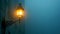 Ornate street lamp radiating a soft glow on a misty blue evening. Copy space