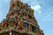 Ornate tower and carvings at Wat Phra Si Maha Utama Devi in Bangkok, Thailand