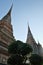 The ornate towers of a Buddhist temple in Bangkok. Buddhist temple complex Wat Phra