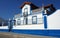 Ornate townhouse in traditional white-and-blue colors in the old town, Avis, Portugal