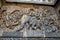 Ornate wall panel reliefs depicting from left Garuda carrying Vishnu, Lord Indra and Indrani on elephant Eirawat and Vishnu rescui