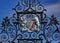 Ornate wrought iron gate of Powis Castle garden in England. Powis Castle garden`s gate in Welshpool, Powys, Wales, England, Europ
