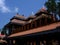 Ornately tiled rooftop with sculptural details of traditional East Asian affluent homeowner.