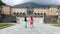 OROPA, BIELLA, ITALY - JULY 7, 2018: Shrine of Oropa, Sanctuary, Sacro monte della beata Vergine. two girls kids run