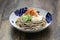 Oroshi soba, Japanese chilled buckwheat noodles topped with grated daikon radish is eaten with soba soup.