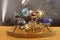 Orrery steampunk art clock with planets of the solar system.