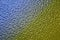 ï¿½orrugated glass surface tinted blue and yellow color