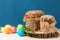 Orthodox baking for the Easter Spring Festival. Traditional cakes and painted eggs. Baking sprinkled with icing,