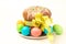 Orthodox baking for the Easter Spring Festival. Traditional cakes and painted eggs. Baking sprinkled with icing,