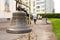 Orthodox bell suspended on a metal beam, close-up