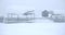 Orthodox cemetery covered with snow in snowfall