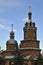 Orthodox Christian Cathedral with golden domes and crosses against the sky, spring day. Tserkov` Smch.kharlampiya, Tsivilsk,