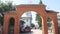 Orthodox church, the entrance gate to the territory of the Orthodox church, the arch, sunny day, green trees