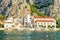 Orthodox church at harbor in Cetina River of Omis