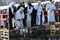 Orthodox Church priest Metropolitan Onufriy blessing people by holy water during ceremony of Great Blessing Of Waters