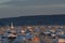 Orthodox Church among the single-storey houses. Winter evening.