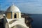 Orthodox church in town of Firostefani and panorama Santorini island, Thira, Greece